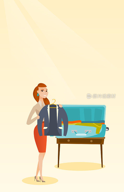 Caucasian woman packing clothes in a suitcase